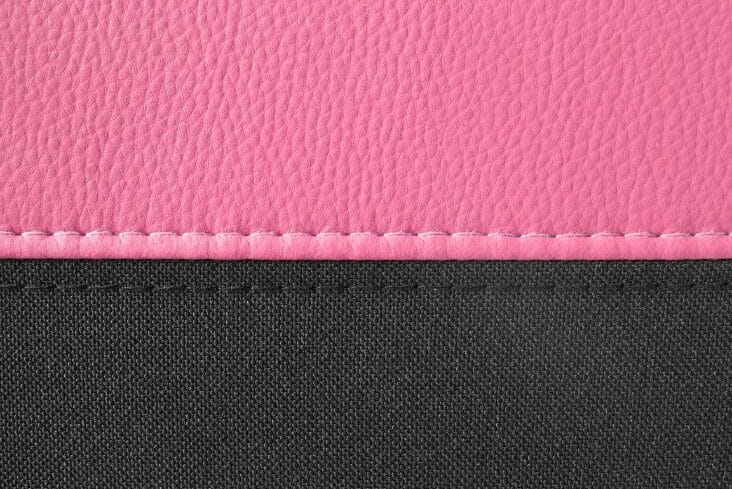 Textured pink and black upholstery material